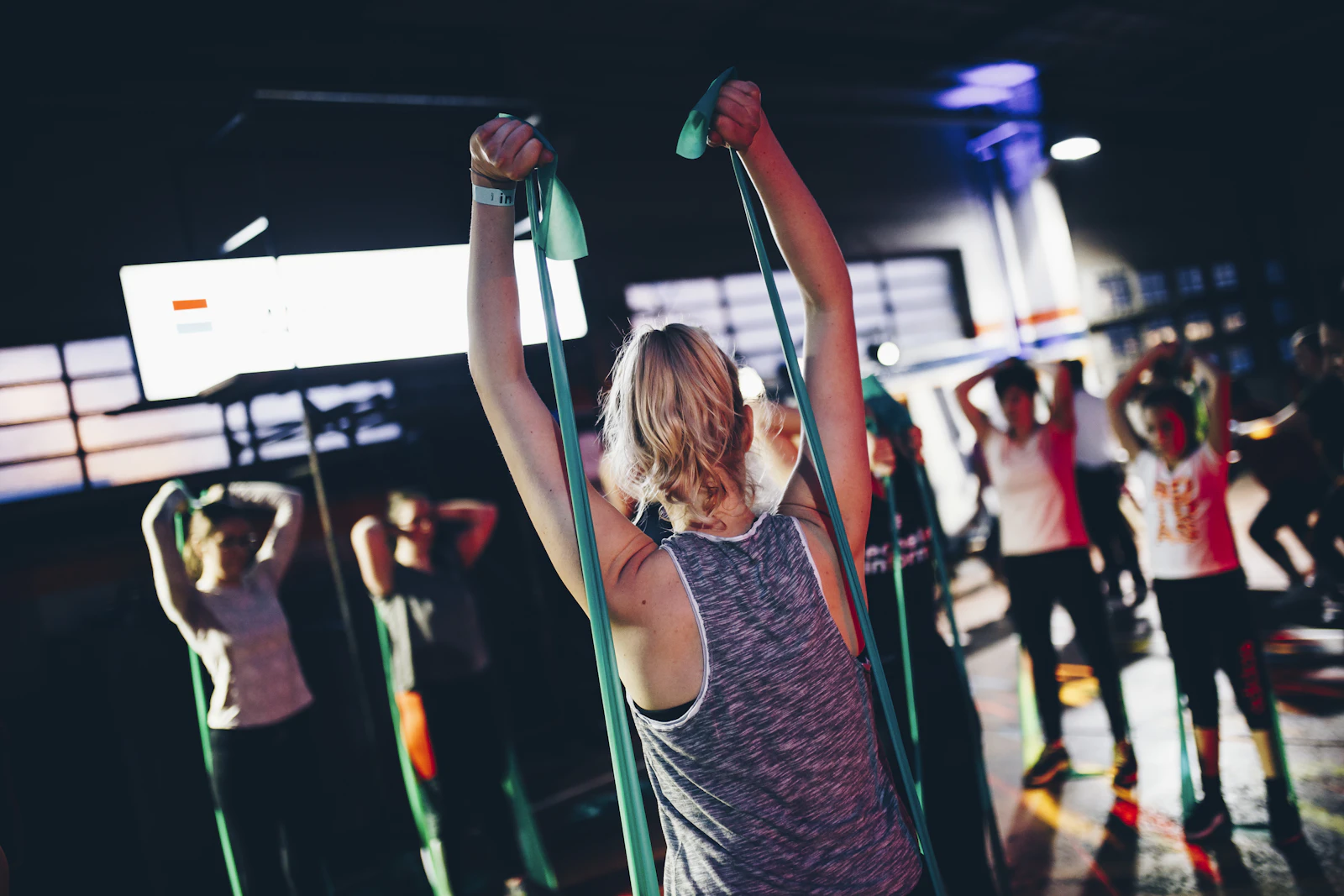 Adults taking part in a group resistance-band exercise session