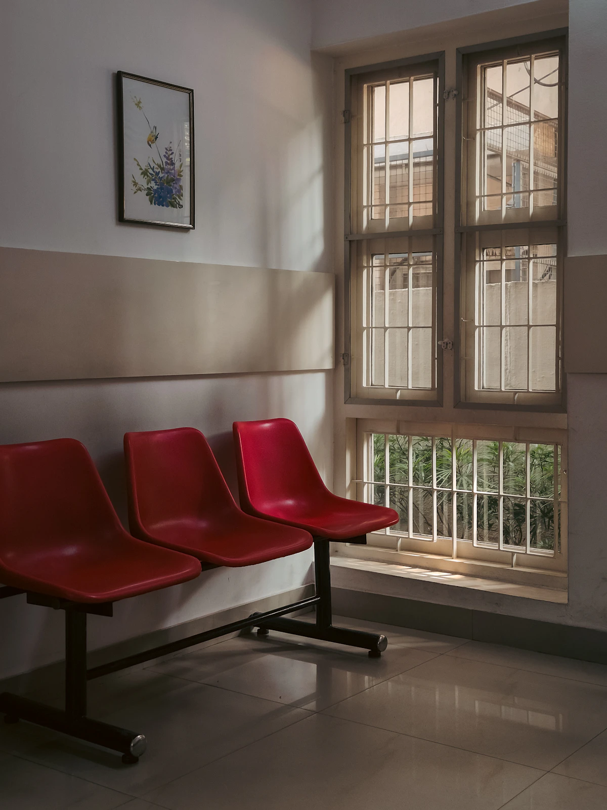 A quiet waiting area with seating and natural light